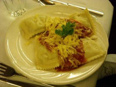 Feta, Spinach and Pinenut Ravioli / Tomato and Oregano Sauce & Parmesan Cheese